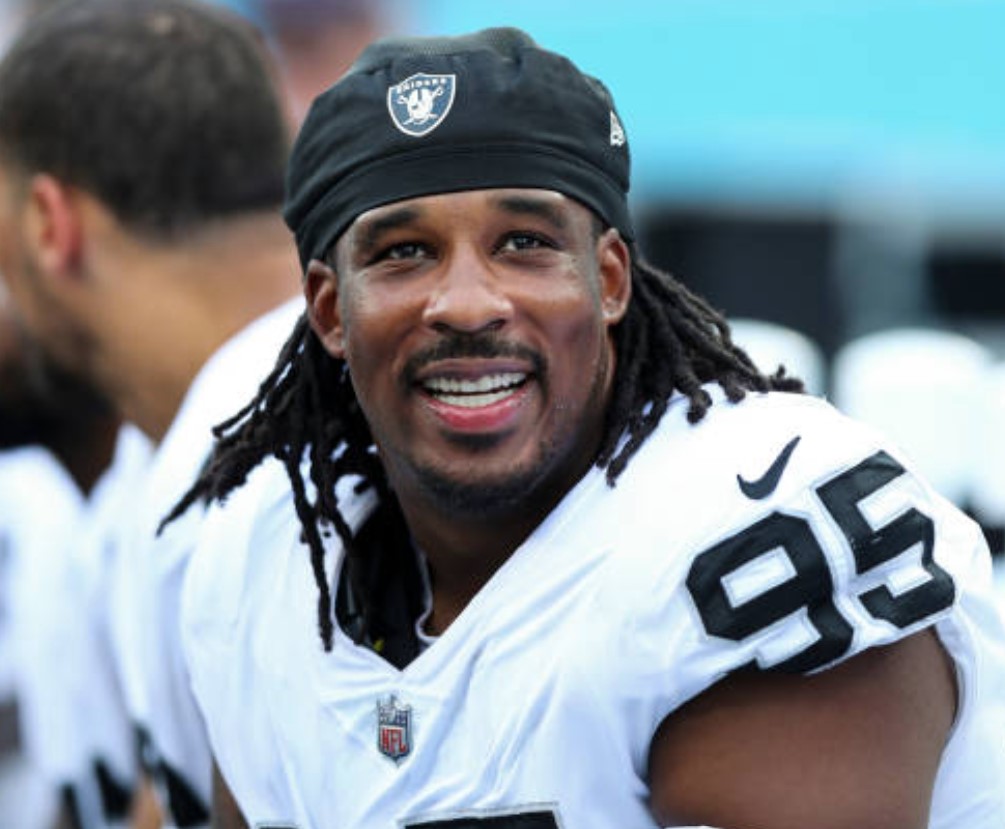 Las Vegas Raiders defensive tackle Kendal Vickers (95) stands on