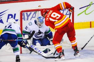 Flames Canucks Begin