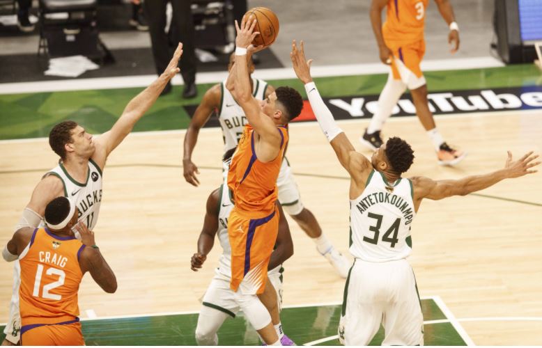 Khris Middleton's 40 lifts Bucks over Devin Booker Suns